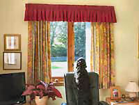 Patterned curtains with matching gathered valance.