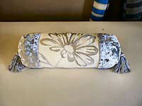 Bolster with tassels