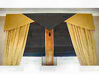 Roman Blinds with pelmet and curtains to match.