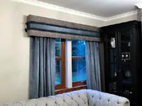 Two tone pelmet with fringing.